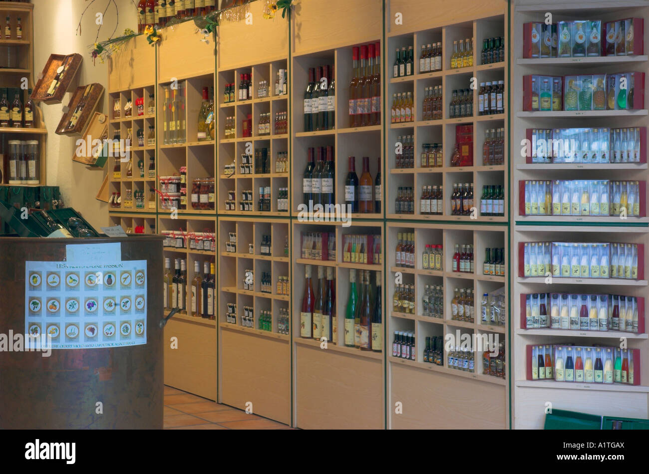 The interior of a wine shop in the Alsace town of Riquewihr Stock Photo