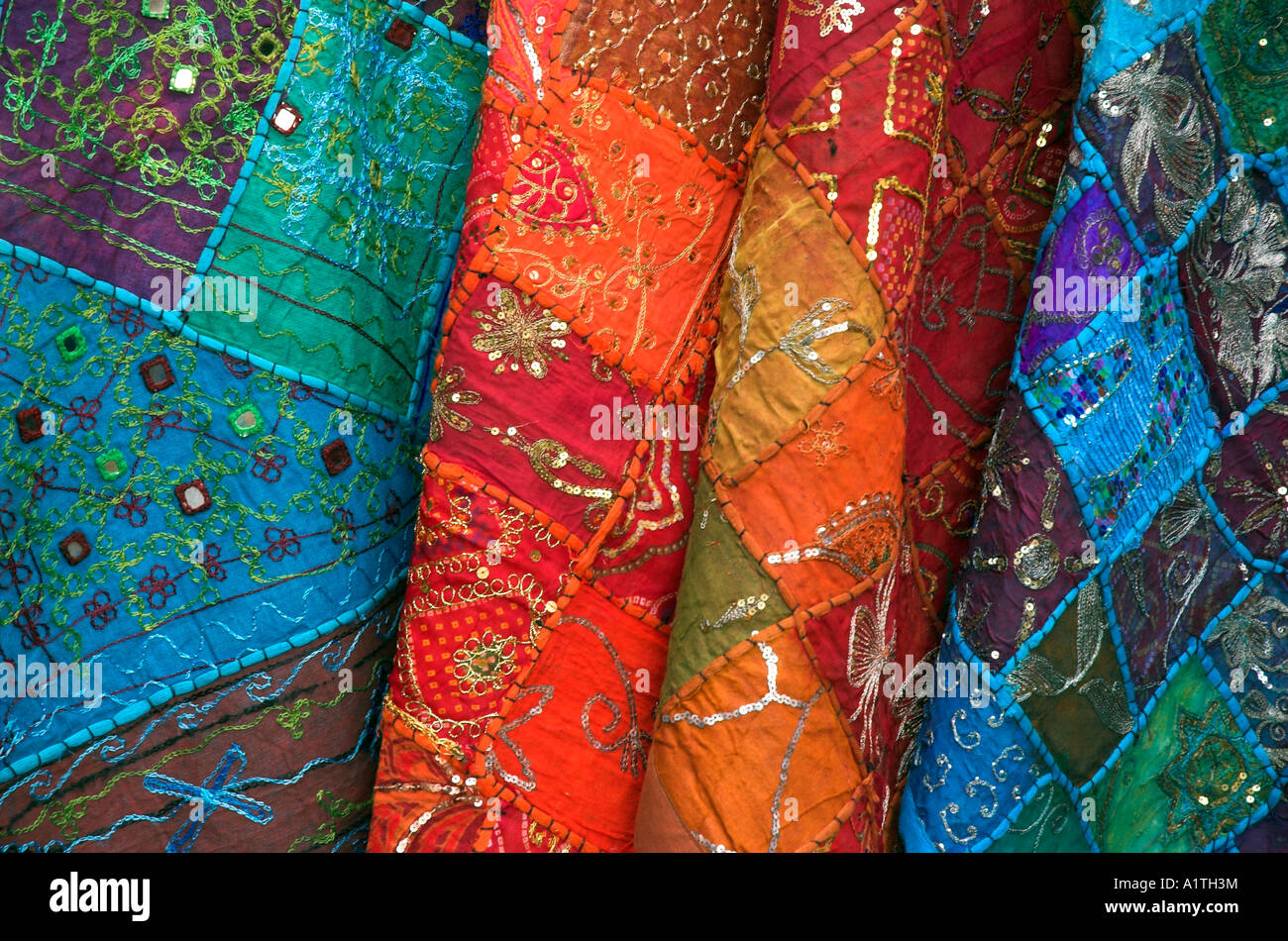 Brightly coloured Indian cloth for sale in Camden Market in London