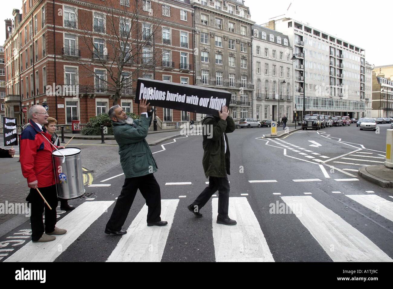 Members of the Pensions Action Group protest up and down Oxford Street in London Stock Photo