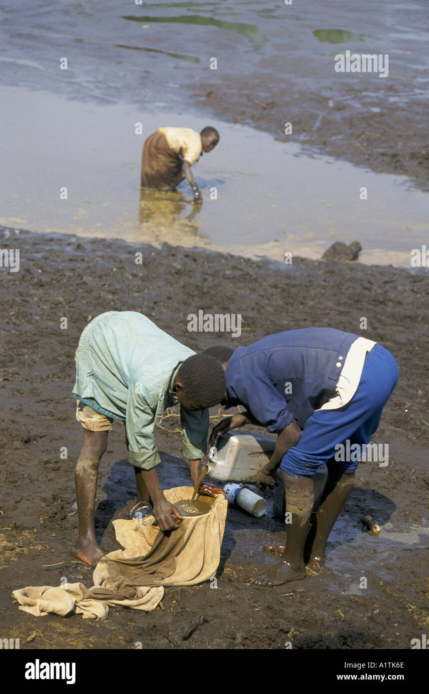 Collecting dirty water africa hi-res stock photography and images - Alamy