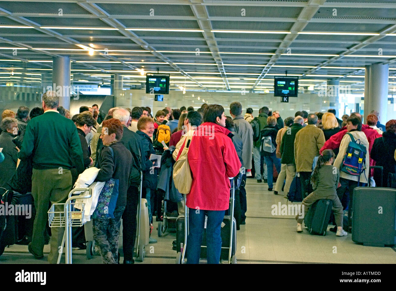 Travelers boarding an airplane in nantes airport france  Stock Photo