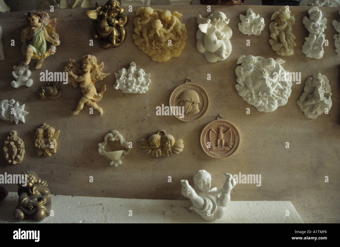 Traditional Cherubs And Medallion Of Benito Mussolini Made Of Stucco Stock Photo Alamy
