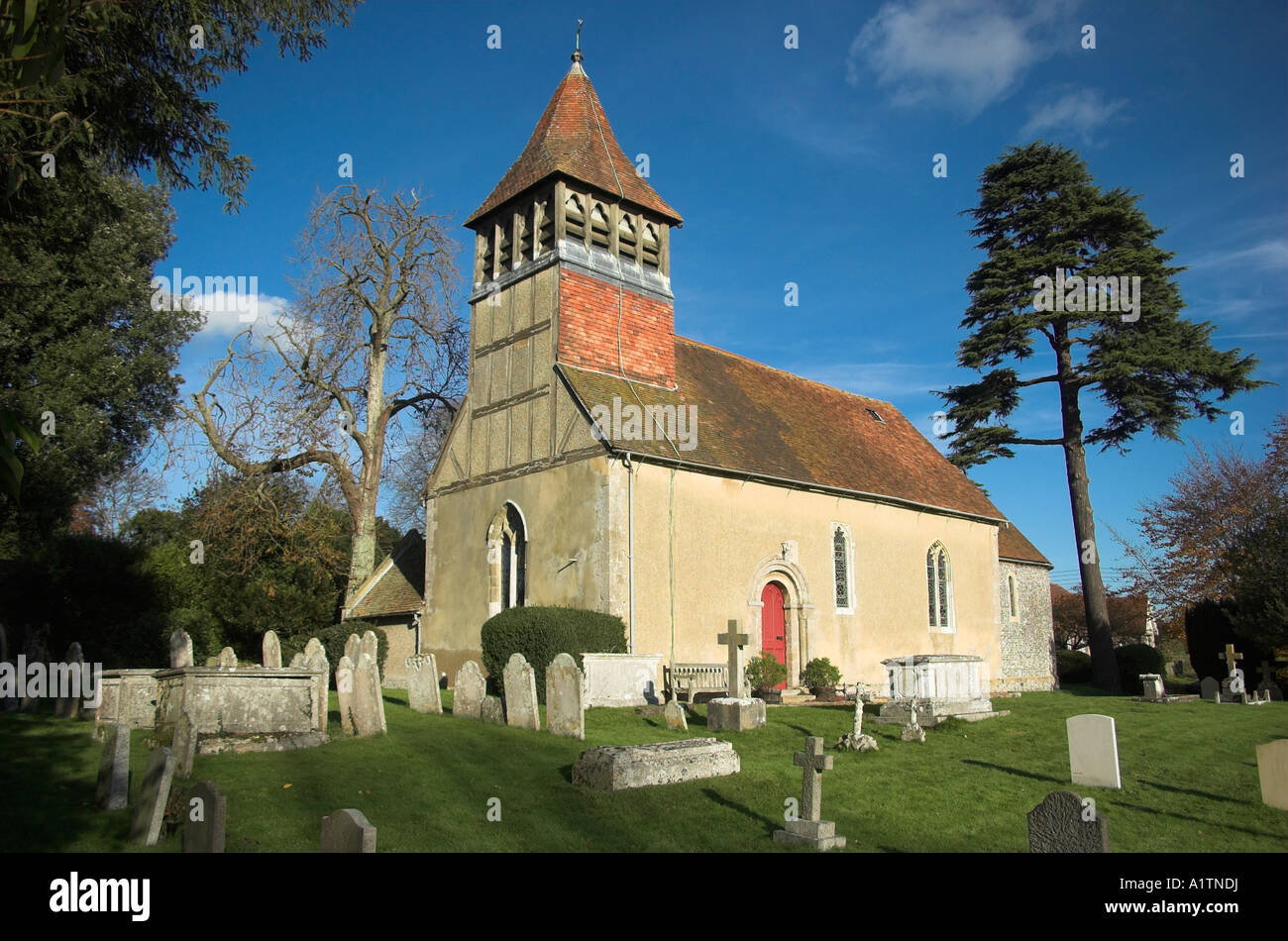 Martyr Worthy church and churchyard in the Itchen valley near Winchester. Stock Photo