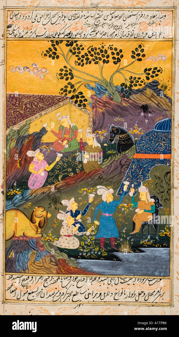 Painting from a 17th century Persian manuscript.  Drinking party outdoors by a river or lake. Stock Photo