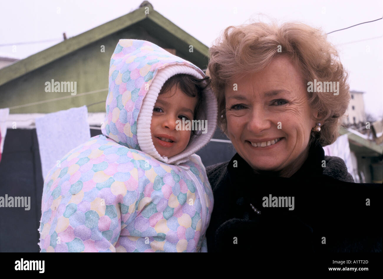 GLENYS KINNOCK IN ROMANIA HOLDING A CHILD WITH AIDS 1996 Stock Photo