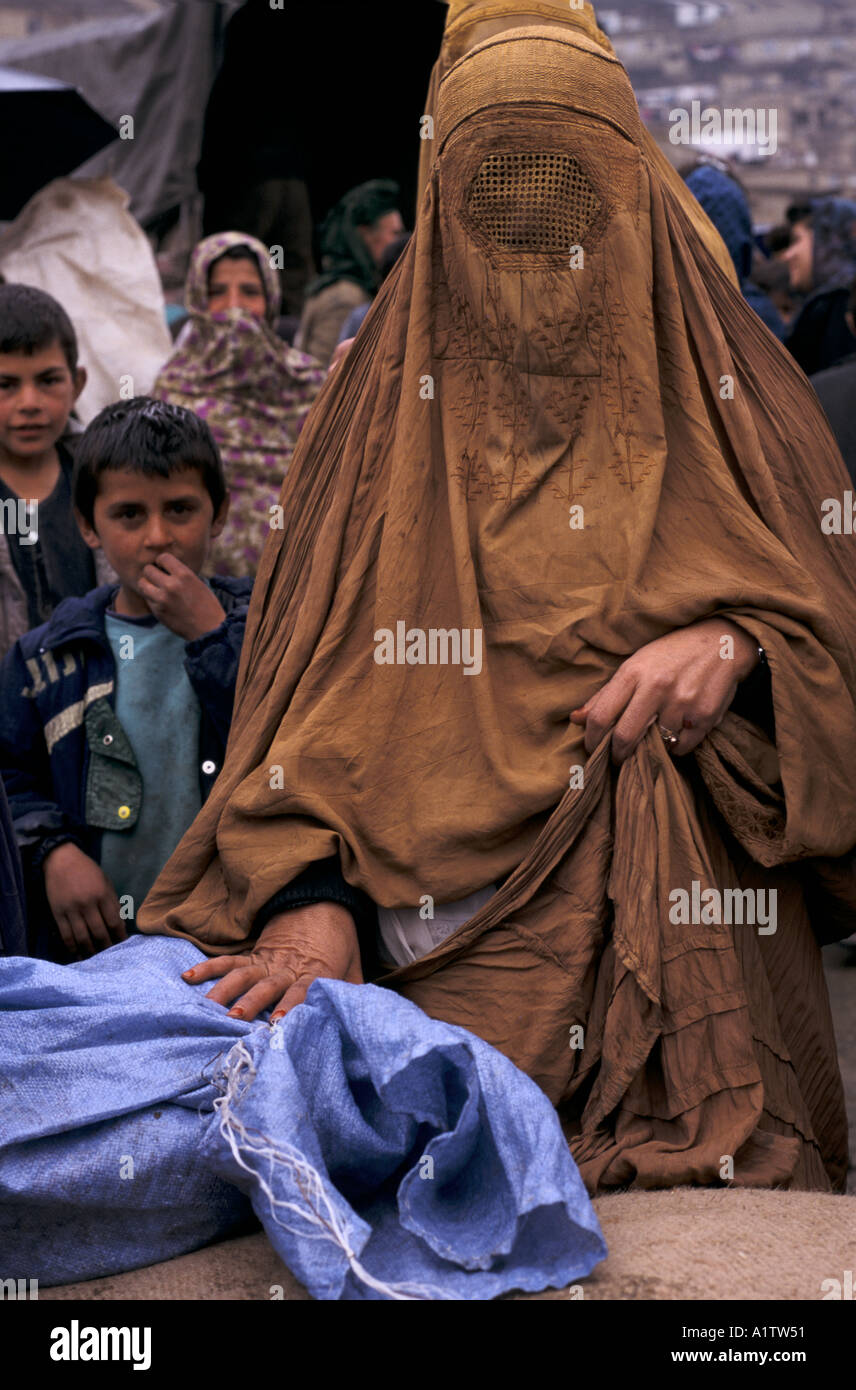 AFGHANISTAN KABUL WIDOWS WAIT FOR FOOD 1996 Stock Photo