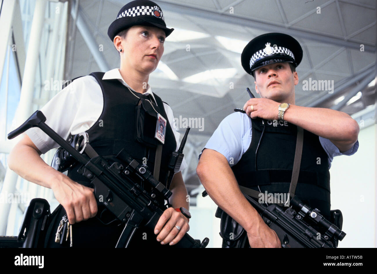 ARMED POLICE AT STANSTEAD AIRPORT Stock Photo