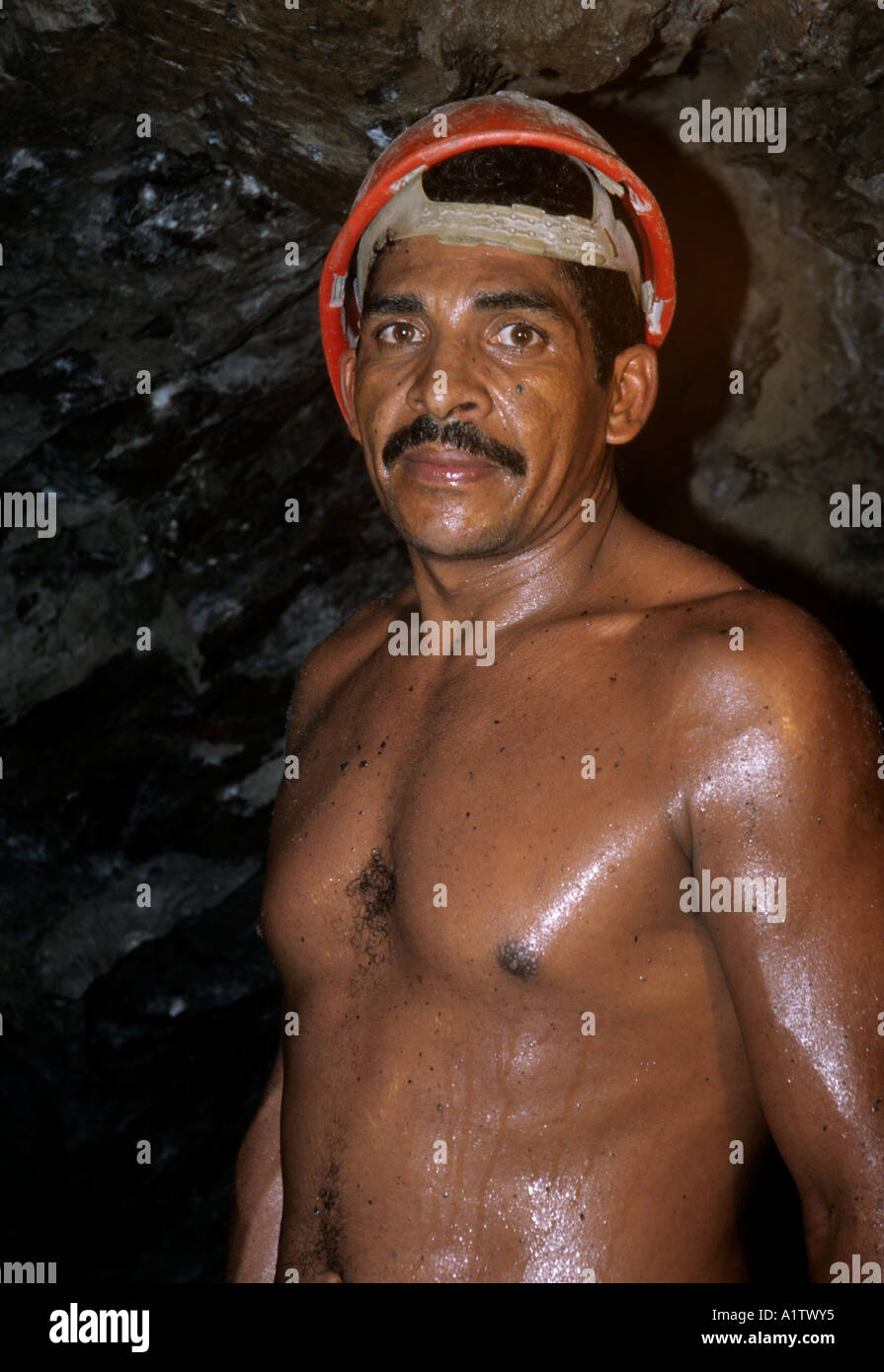 miner extracting a pocket of emeralds in a mine in Campo Formoso Chapada Diamantina area Stock Photo