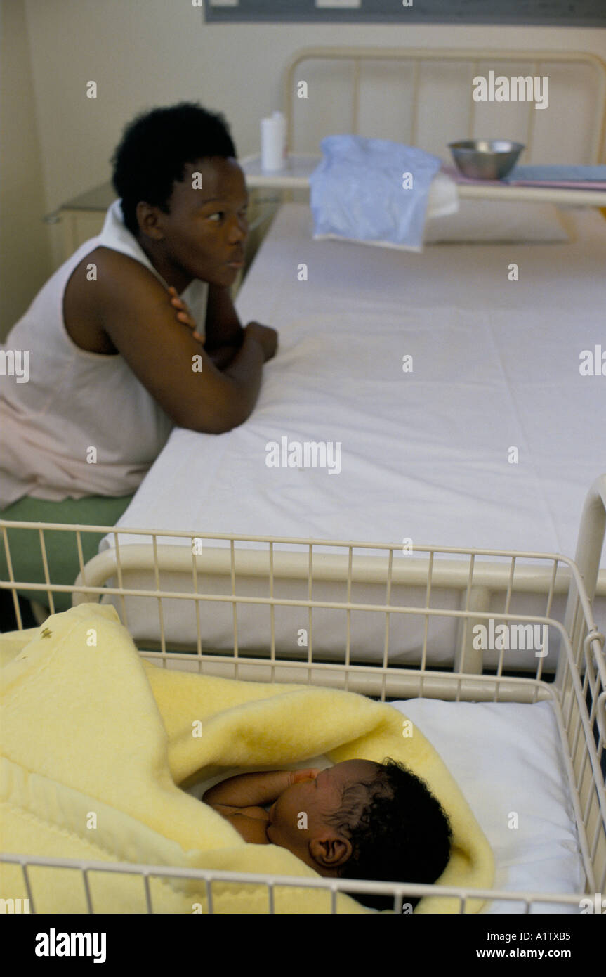 ALEXANDRA TOWNSHIP CLINIC SOUTH AFRICA New born baby in cot next to