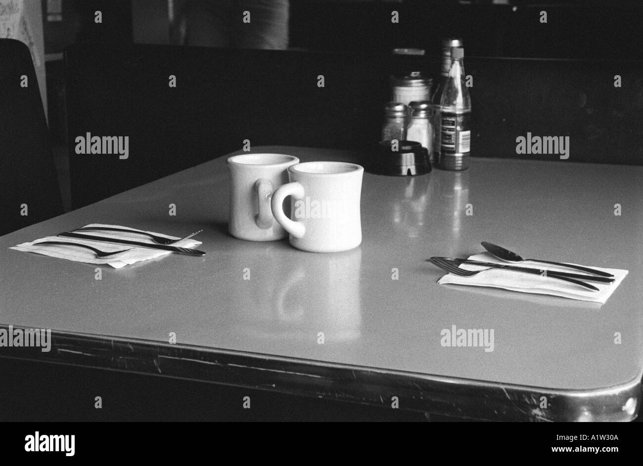 Empty table at a diner with two place settings Stock Photo Alamy