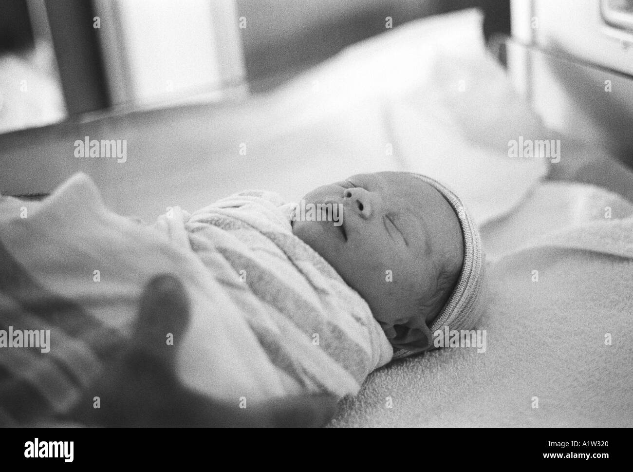 Newborn baby boy in a hospital room Stock Photo