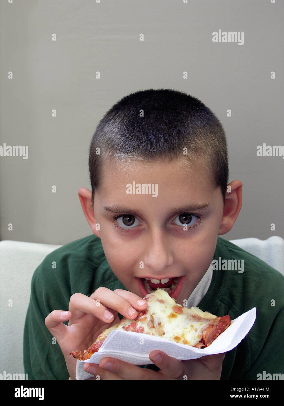 First bite of pizza Stock Photo Alamy