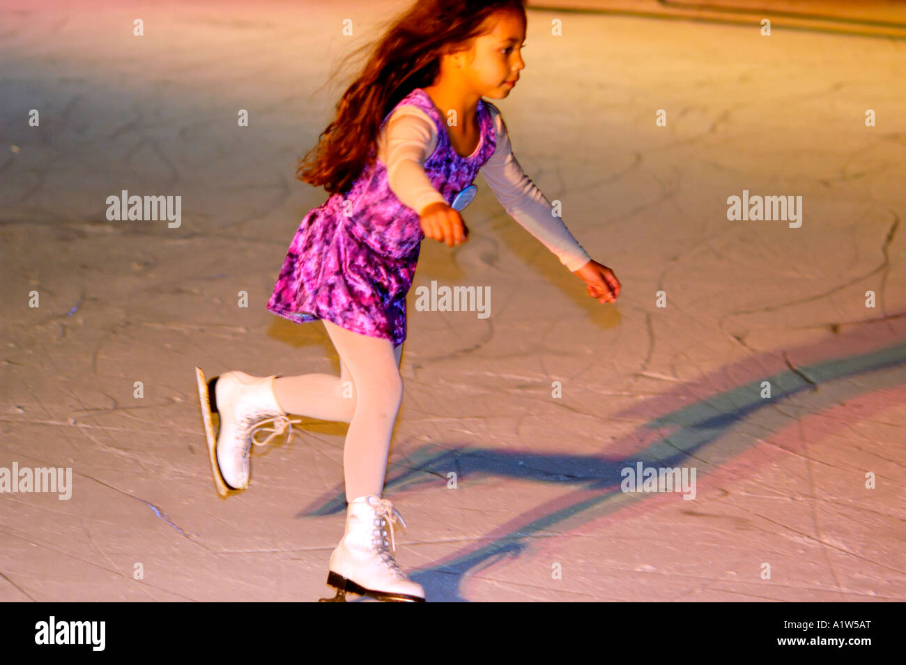 Child skating at Horton Plaza Ice skating rink San Diego California USA