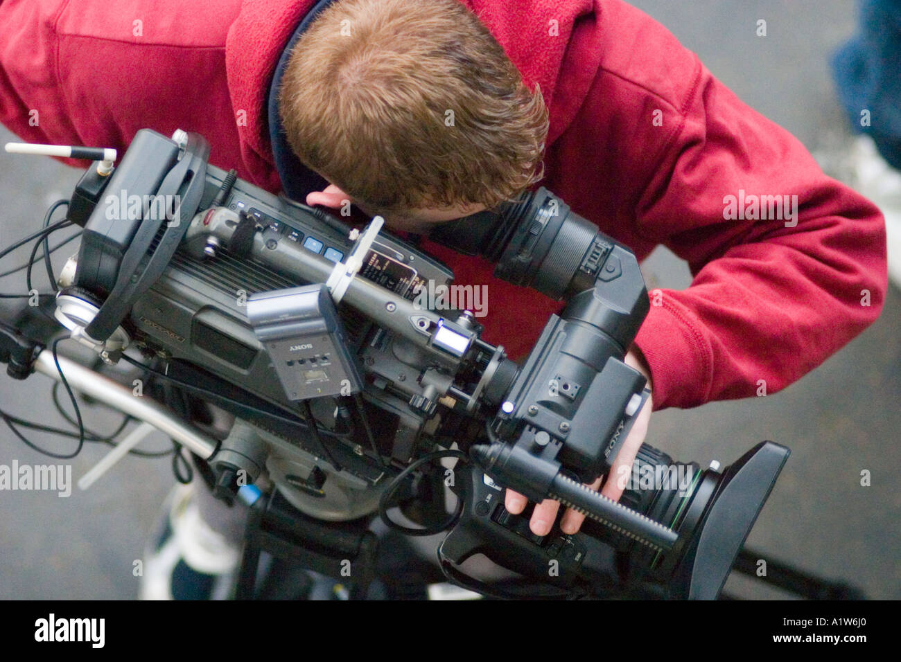 Blue Peter BBC cameraman viewed from above at National Cat Show Olympia London Stock Photo