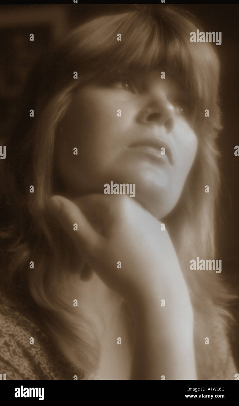 Portrait of a woman sepia toned hi-res stock photography and images - Alamy