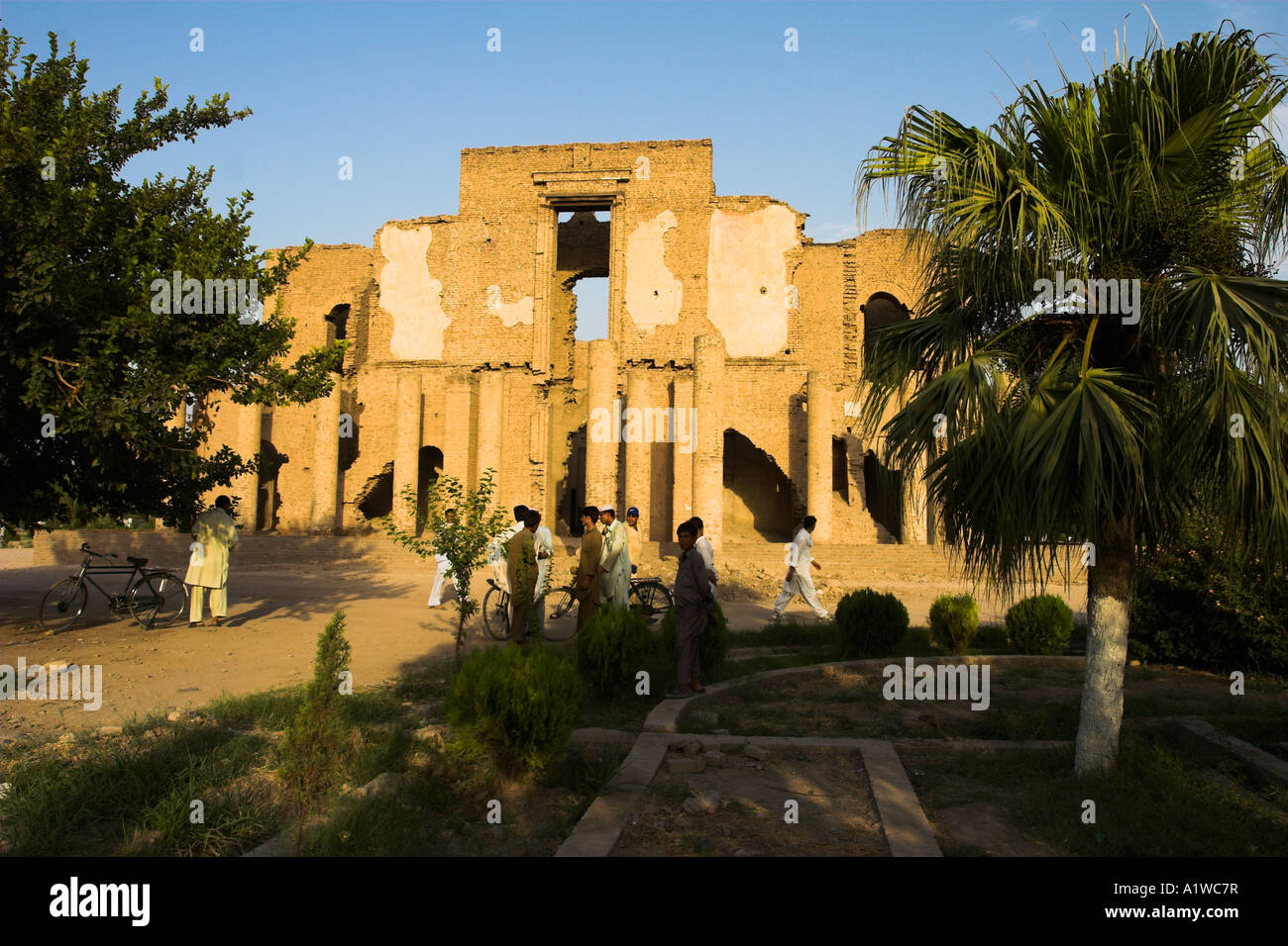 AFGHANISTAN Jalalabad Local men at Seraj â ul Emorat Light of buildings