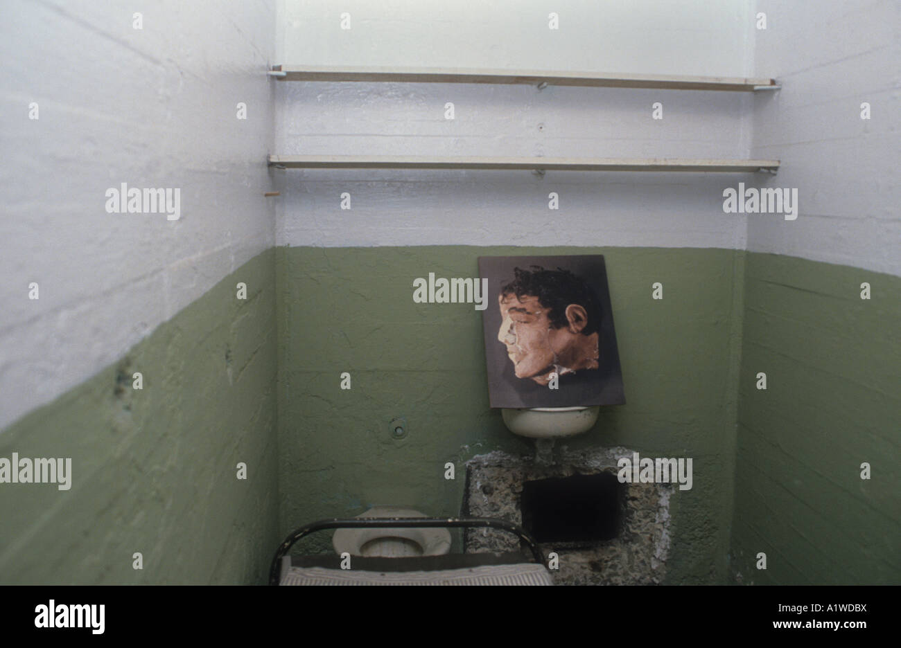 Alcatraz Prison Cell,Portrait Of The Prisoner Who Occupied The Cell & Escaped With Two Others Never To Be Seen Again. Stock Photo