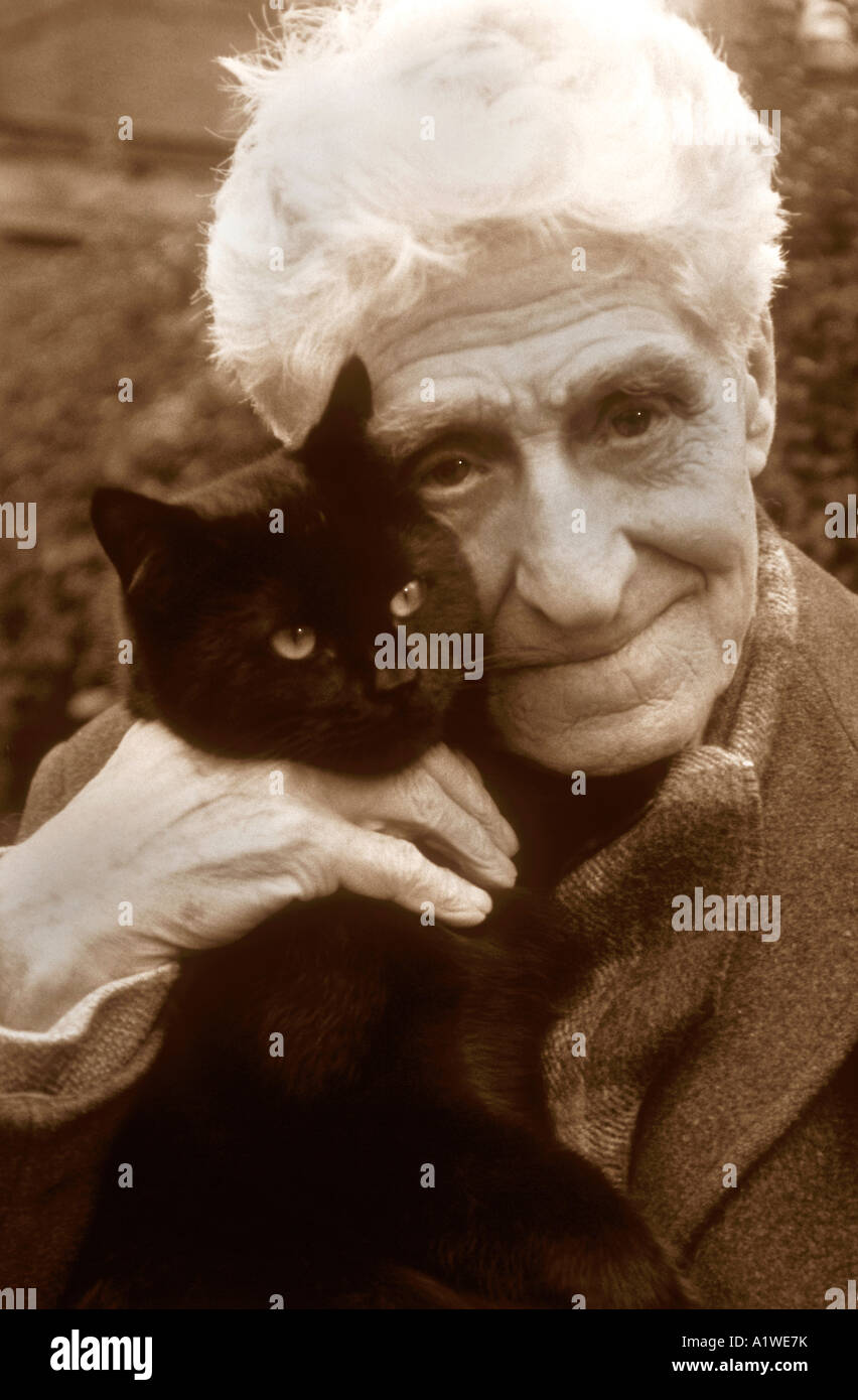 Portrait Of An Old Man In His Eighties ,Holding His Pet Black Cat. Stock Photo
