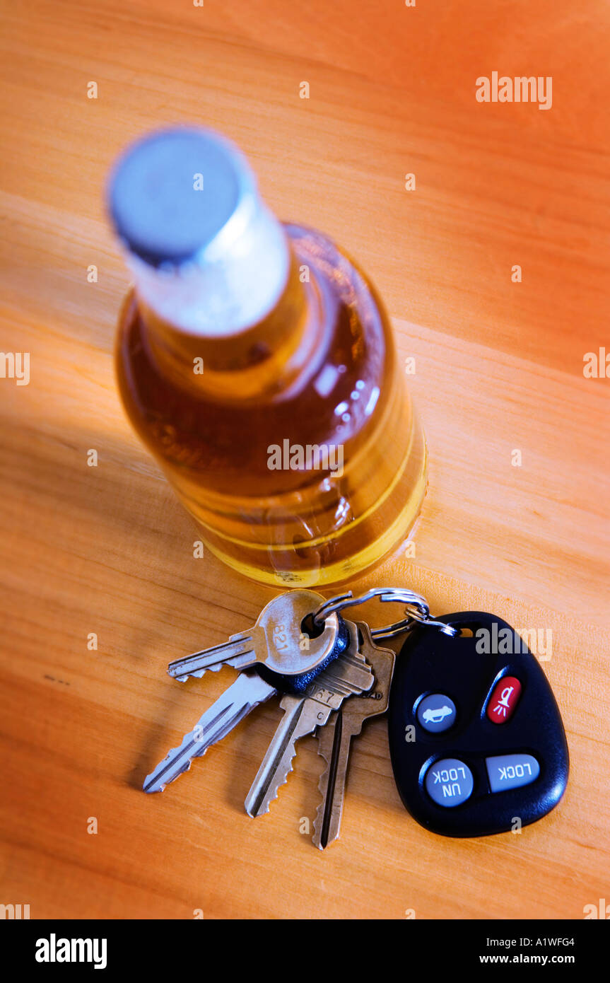Beer bottle and car keys Stock Photo Alamy