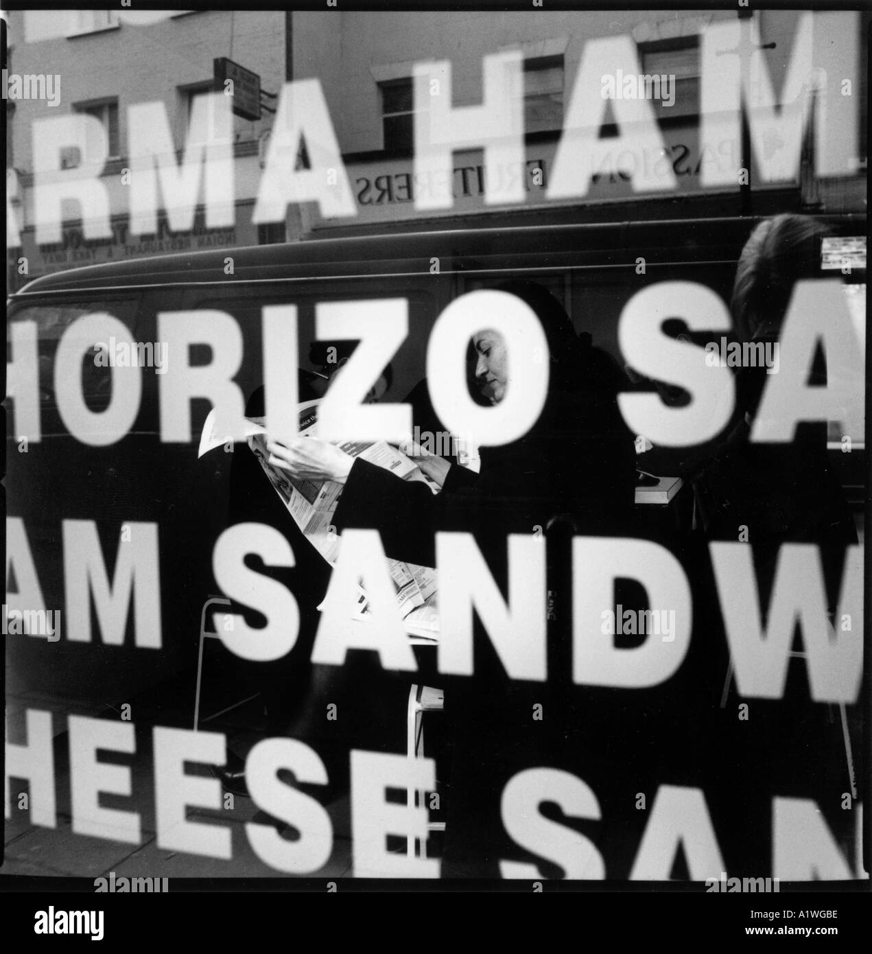 Exmouth market Islington Crowbar Cafe View into cafe through writing on the window Stock Photo
