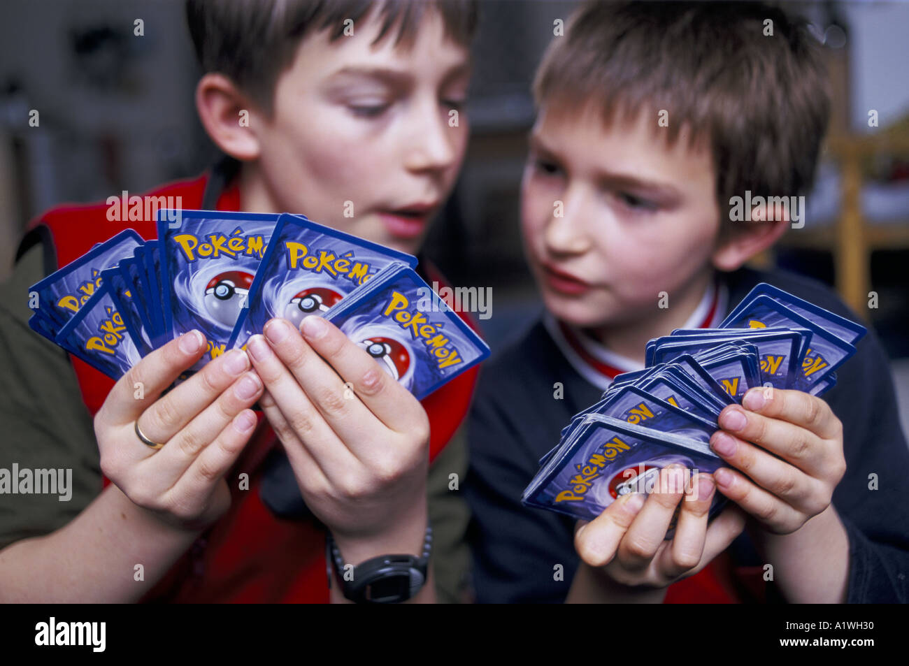 CHILDREN PLAYING WITH POKEMON CARDS LONDON 2000 Stock Photo 3374383 children-playing-with-pokemon-cards-london-2000-stock-photo-3374383