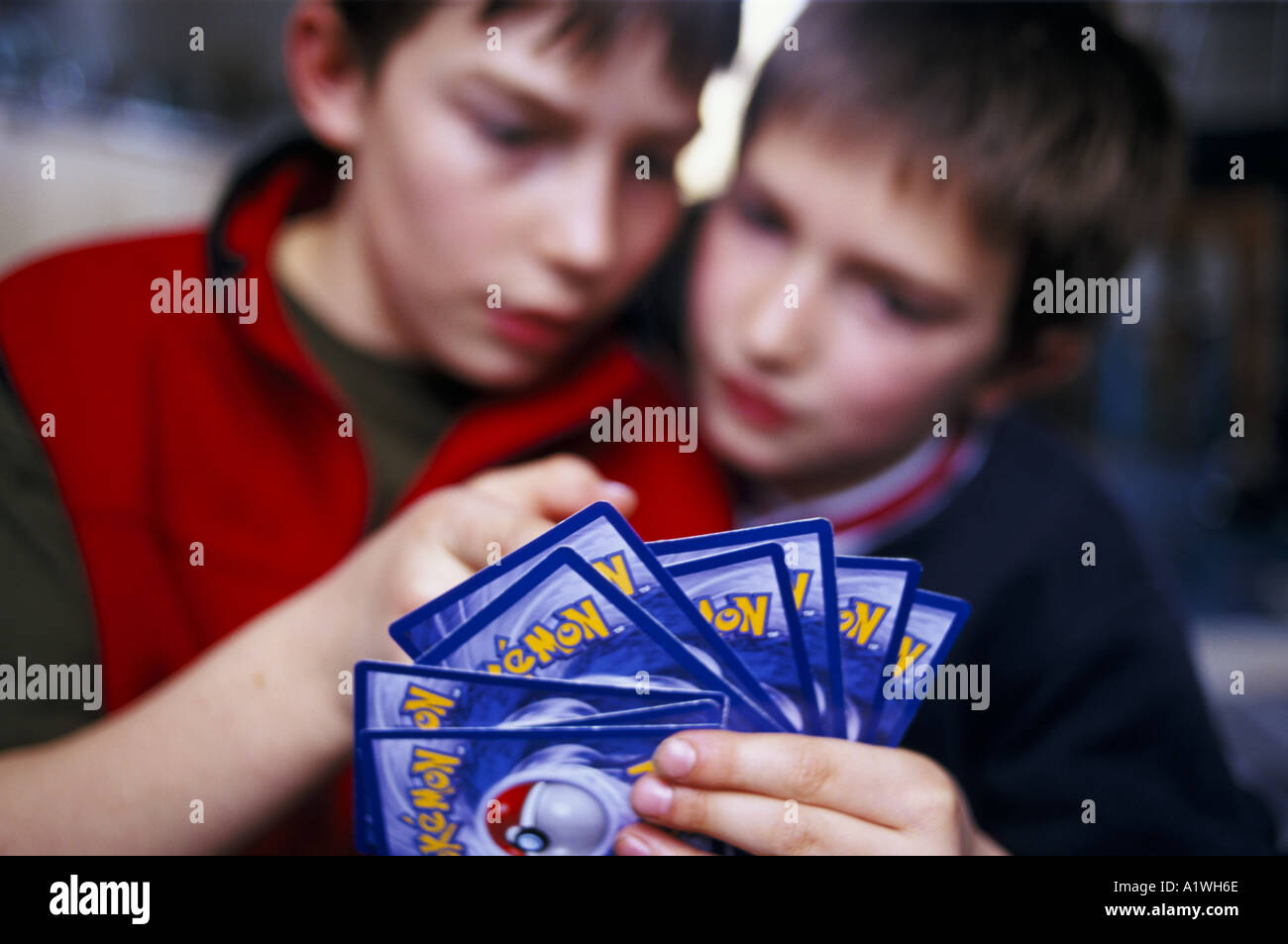 CHILDREN PLAYING WITH POKEMON CARDS LONDON MAY 2000 Stock Photo - Alamy