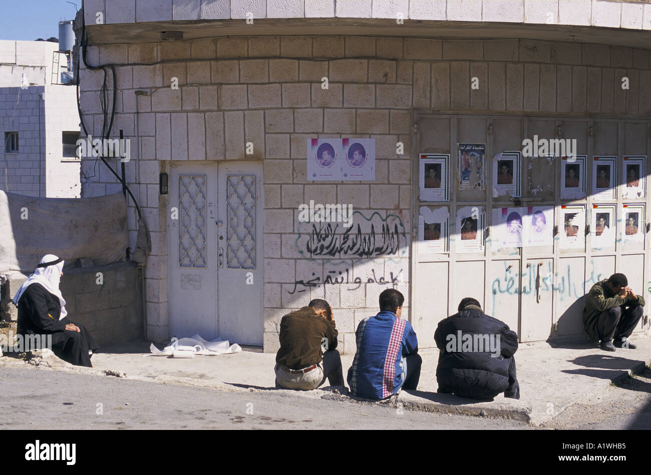 UNEMPLOYED MEN IN RAMALLAH.WORKERS CANNOT TRAVEL TO ISRAEL BECAUSE THE EREZ BORDER HAS BEEN SHUT  2000 Stock Photo
