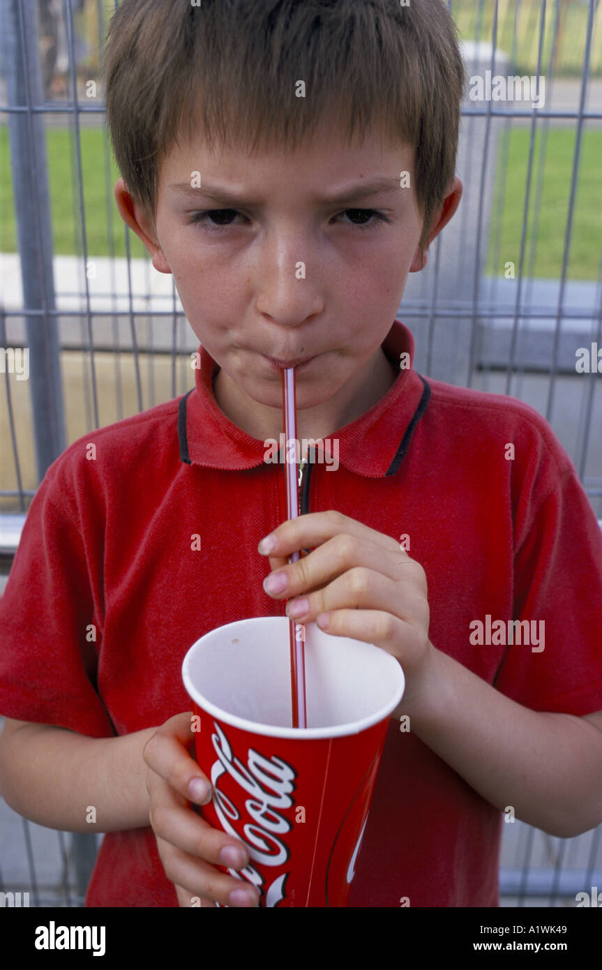 Coca cola drinking child hires stock photography and images Alamy