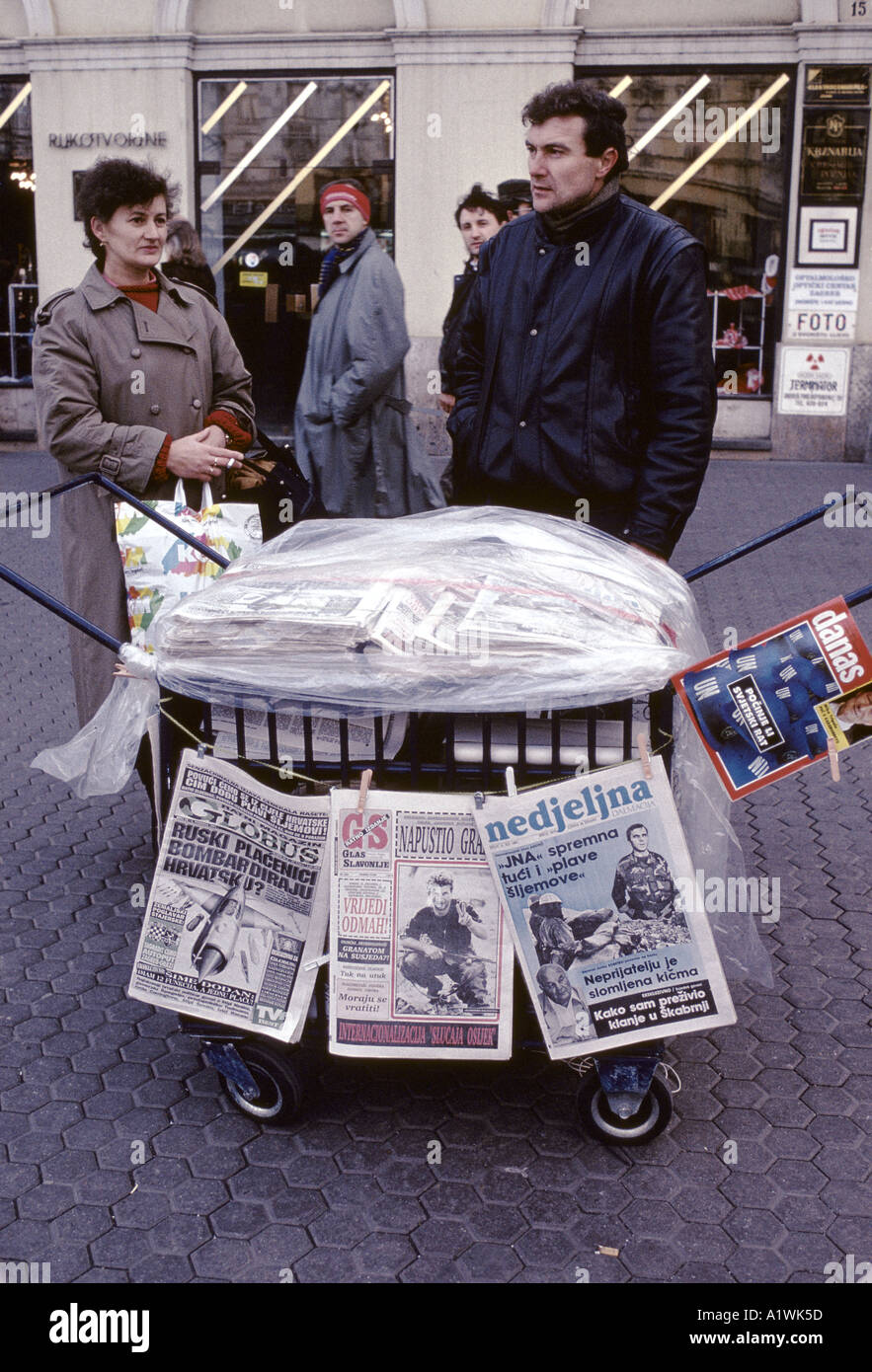 ZAGREB SELLING NEWSPAPERS ON THE STREET DURING THE WAR. CROATIA Stock Photo