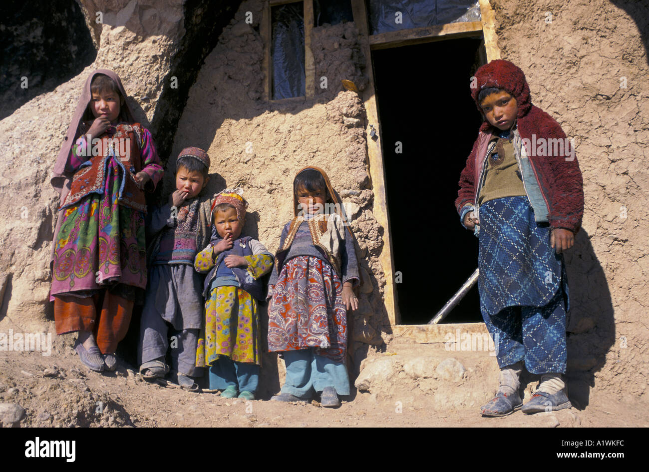 YOUNG HAZARI CAVE DWELLERS BAMIAN/Bamyan .AFGHANISTAN 1998 Stock Photo