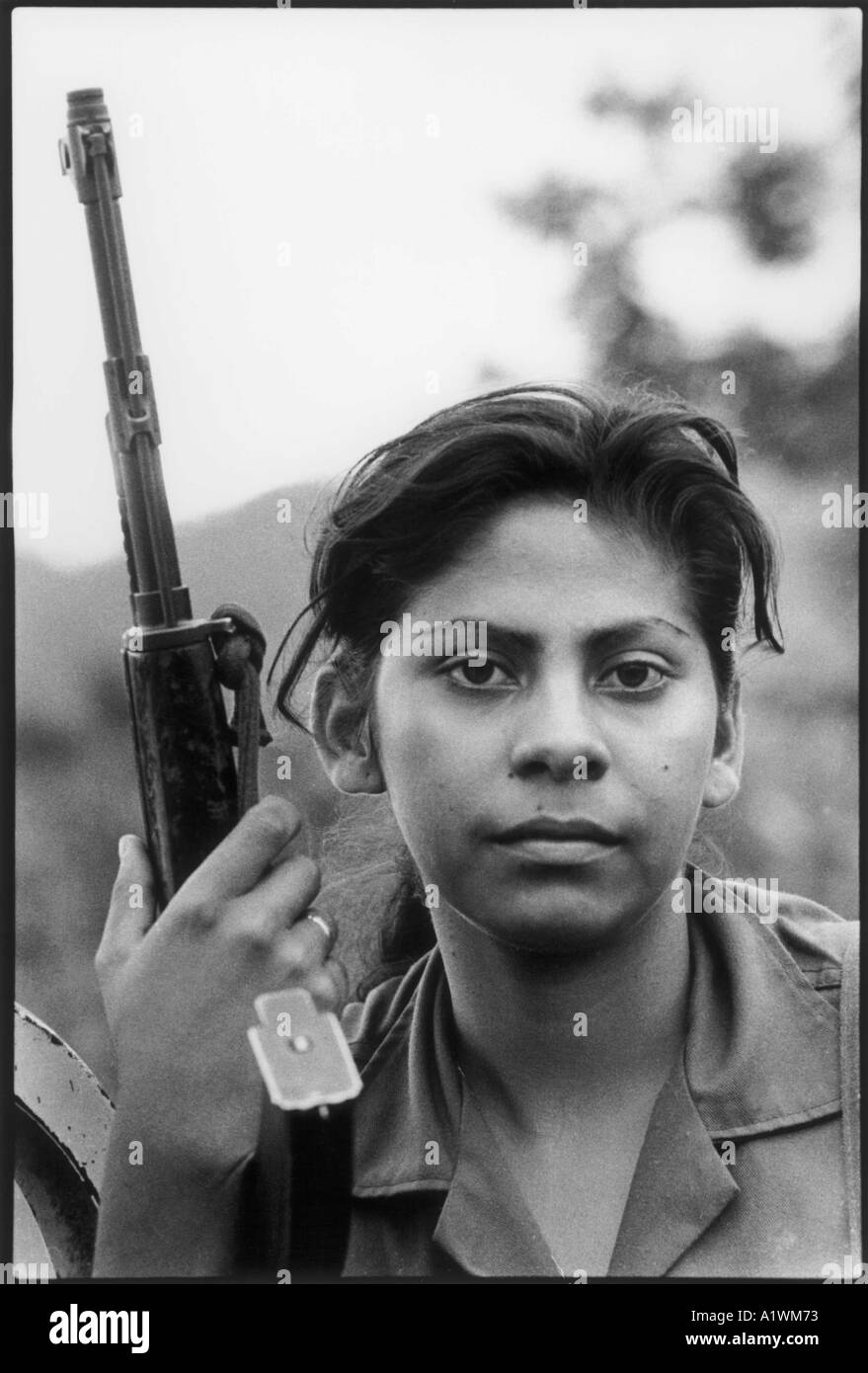 A young female Nicaraguan soldier returns from the frontline during the contra war Stock Photo