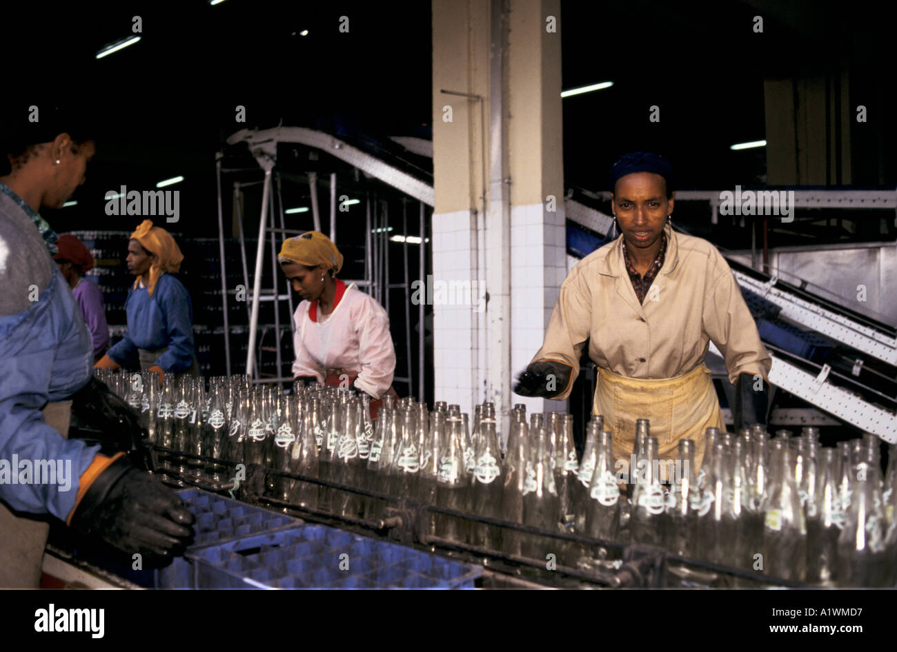 PEPSI COLA FACTORY ETHIOPIA ADDIS ABEBA .Workers checking bottles on