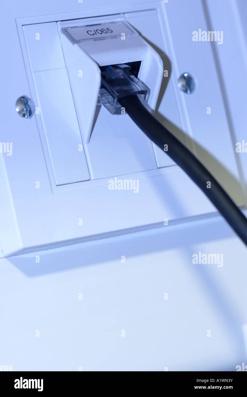 cable plugged in to socket Stock Photo Alamy