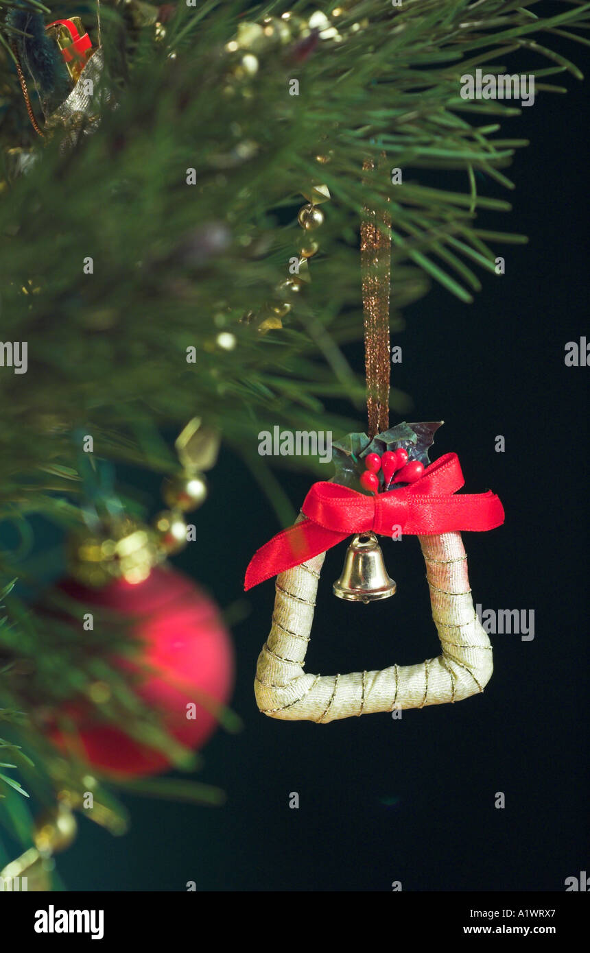 Close up of a traditional Christmas tree decoration hanging on a Christmas Tree Stock Photo