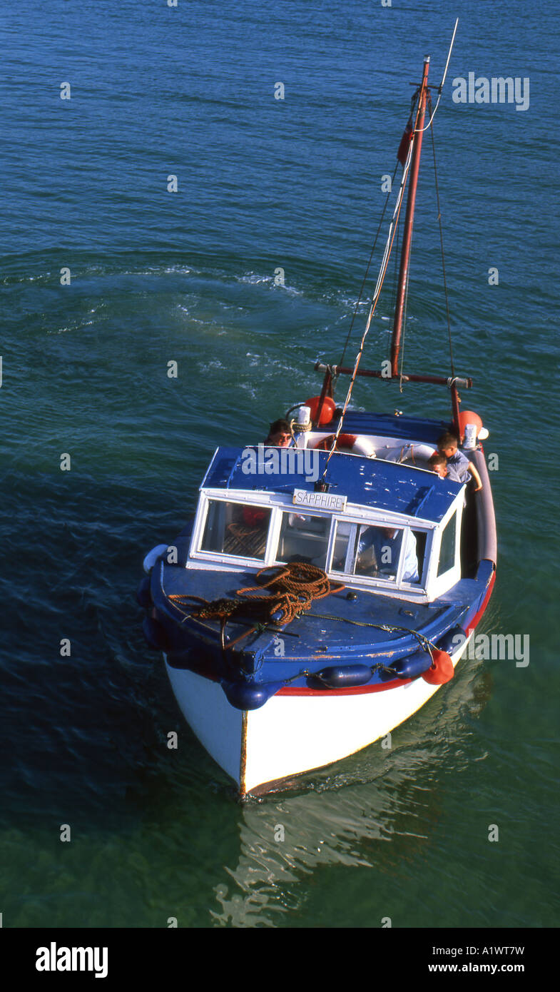 Manouvering pleasure boat in st ives cornwall harbour number 1866 Stock