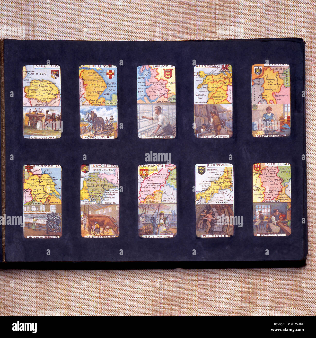 Old cigarette cards in an album Stock Photo Alamy