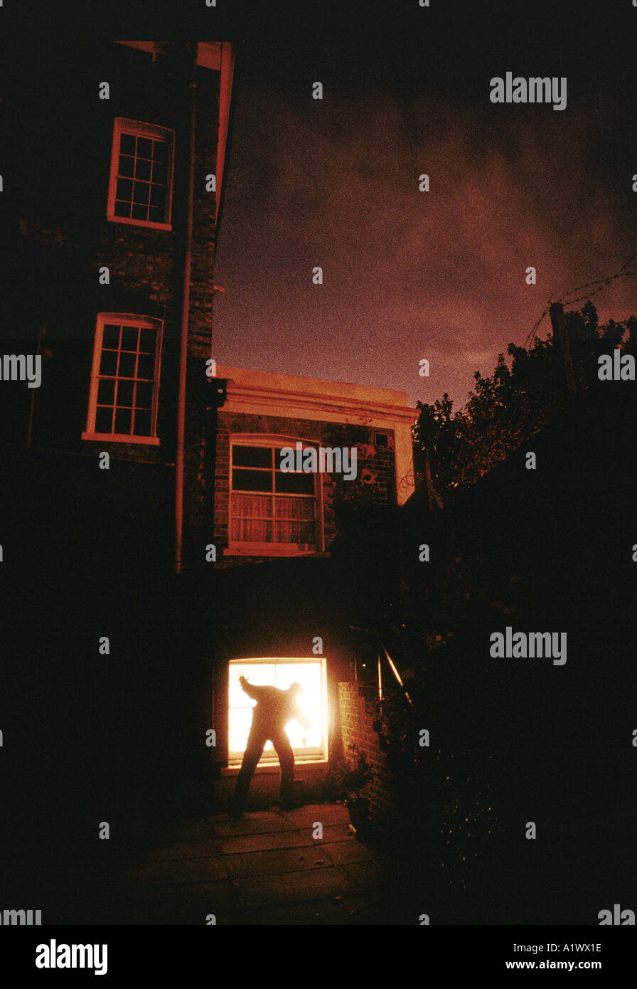 HOUSE BREAK IN POSED BY MODELS Stock Photo Alamy