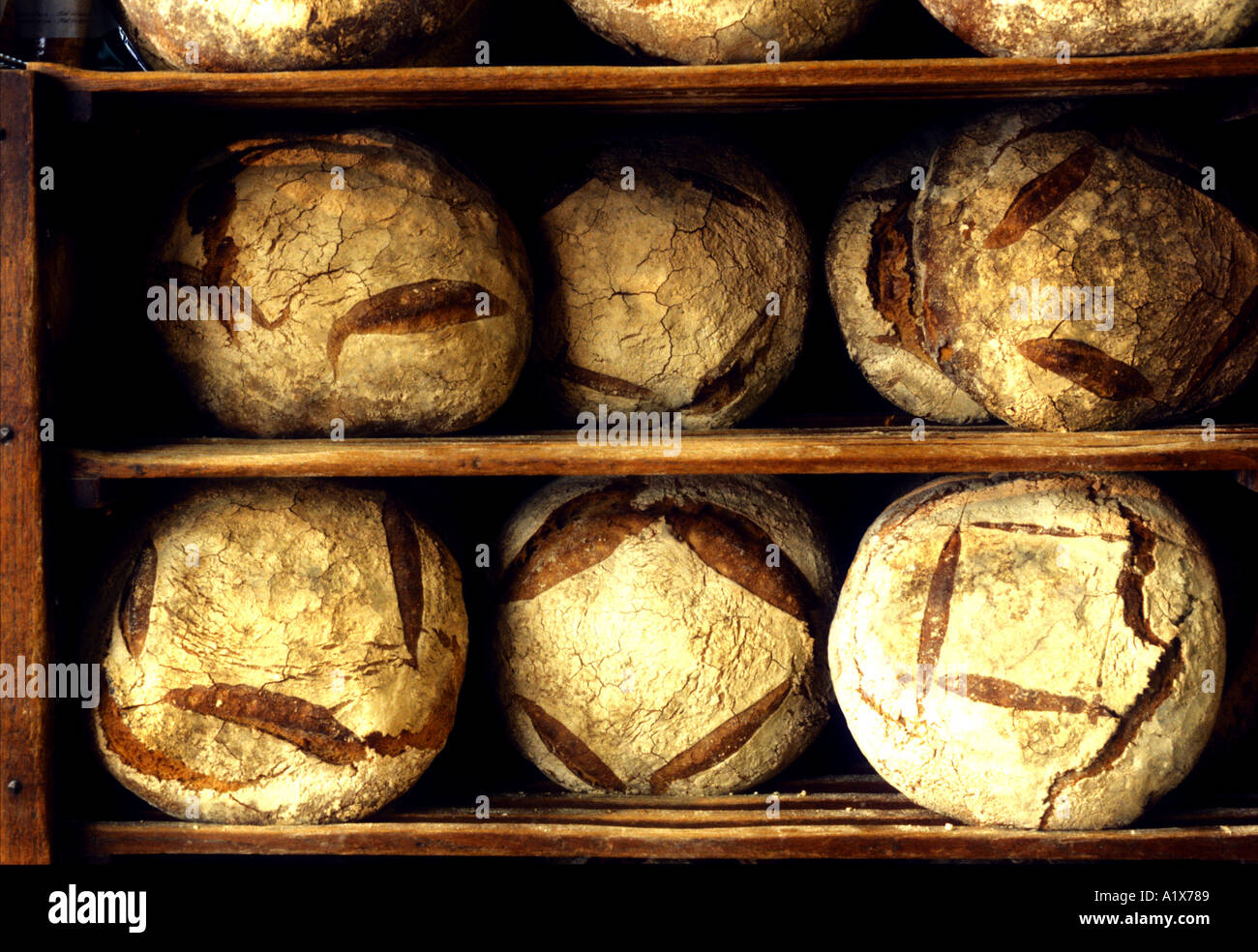 Loaves of bread in Poilane bakery paris Stock Photo Alamy