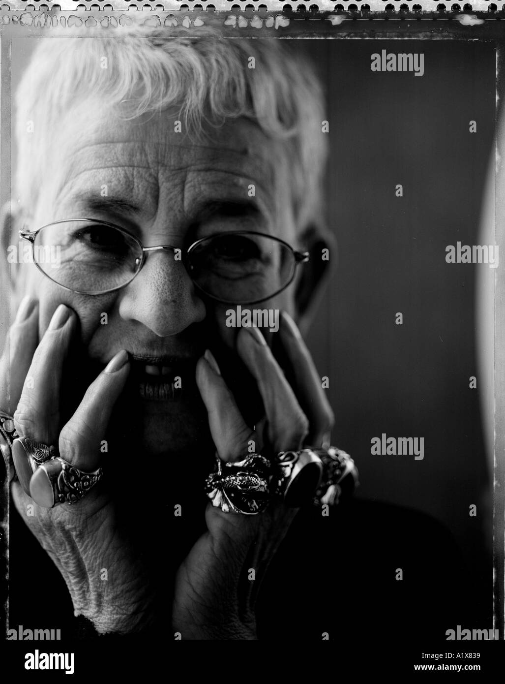 Portrait of the childrens author Jacqueline Wilson with her amazing rings on her fingers UK Stock Photo