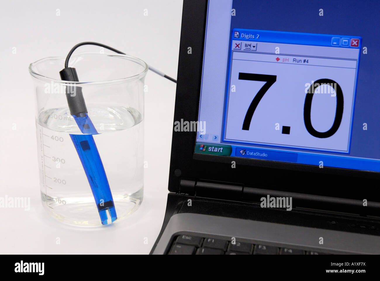 Digital pH sensor measuring the pH of pure water showing it to be 7.0 Stock Photo