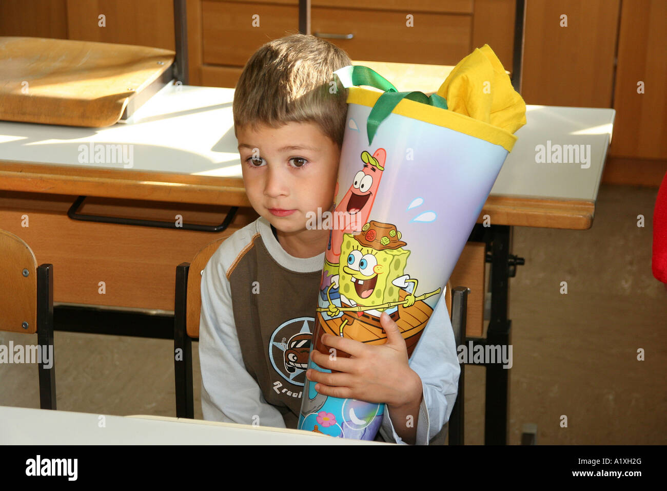 child with a paper funnel Stock Photo