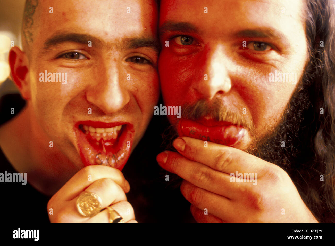 Men with tattoos on their inside lip Stock Photo  Alamy