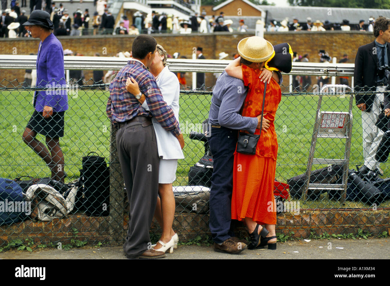 COUPLES SNOGGING AT ASCOT Stock Photo Alamy