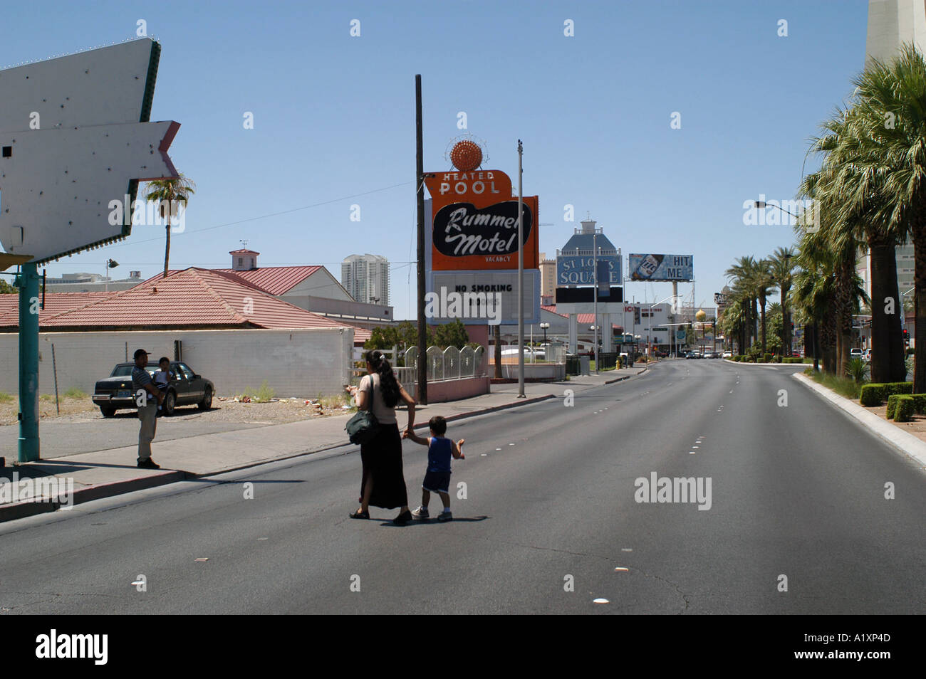 Mother and child cross the strip, Las Vegas  Boulevard, Las Vegas Nevada USA Stock Photo