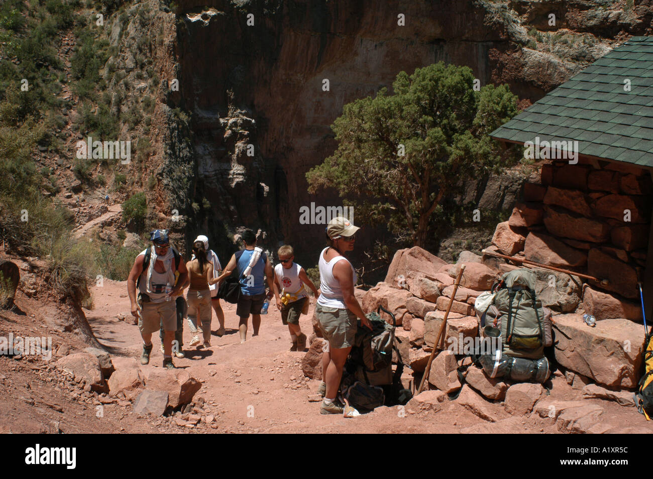 Tourists at the 3 Mile rest house on the Bright Angel Trail, Grand Canyon, Arizona USA. Stock Photo
