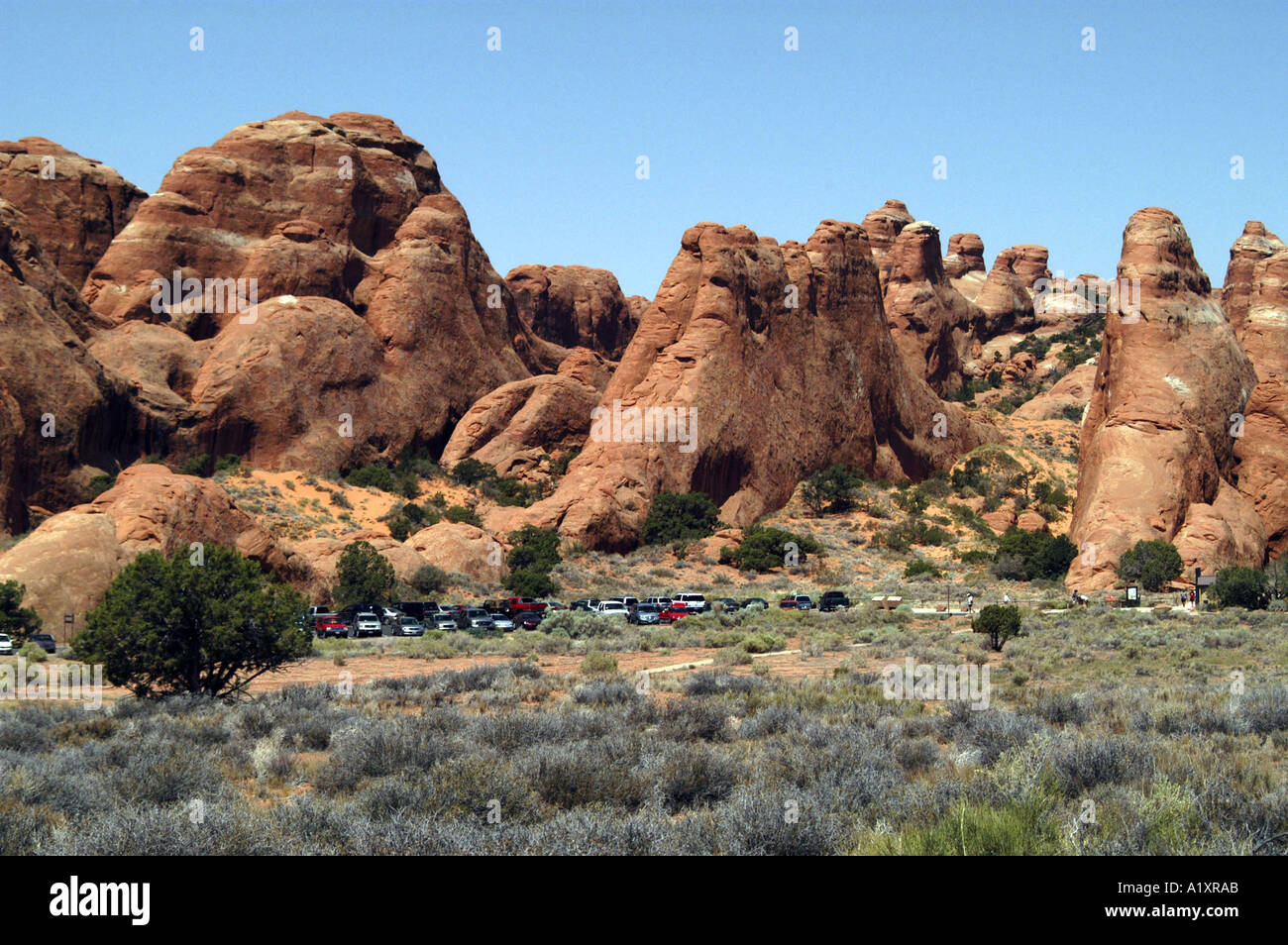 Vehicles parked at Arches National Monument. Moab, Utah, USA. Stock Photo