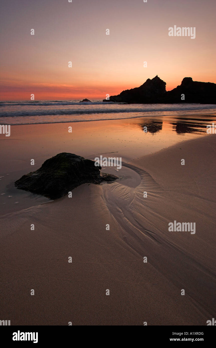 Sunset at the wonderful sandy and rocky shoreline at Bedruthan Steps, Cornwall, England Stock Photo