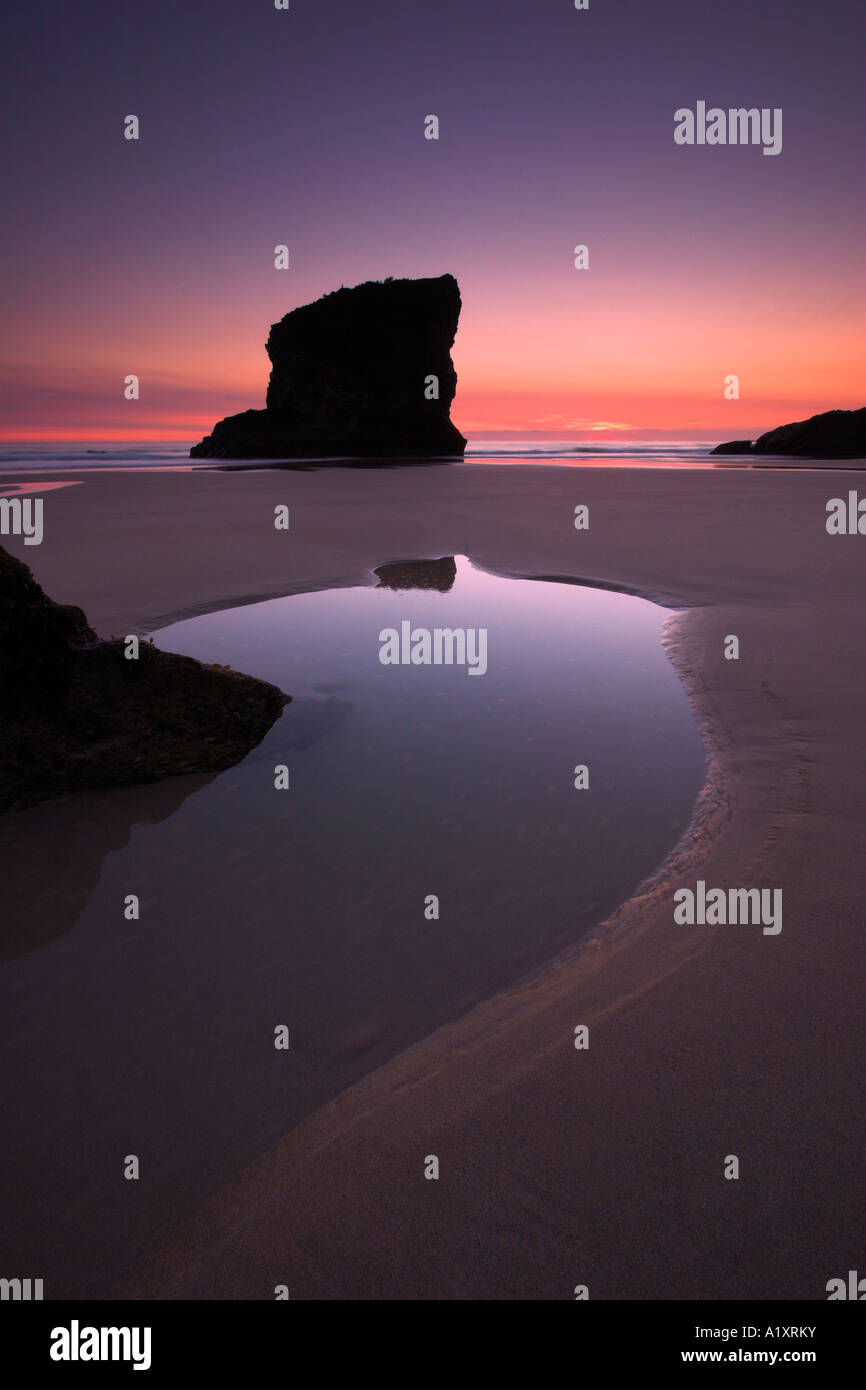 Rockpools on a pristine beach in the twilight, Bedruthan Steps, Cornwall, England Stock Photo
