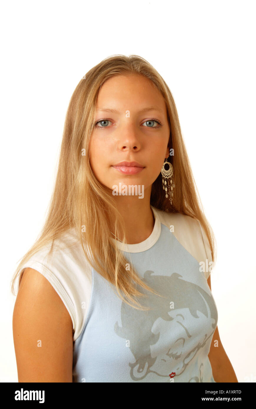 Portrait of a pretty young woman looking at camera Stock Photo - Alamy