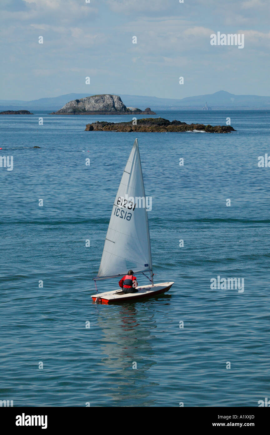 single handed sailing dinghy in the Forth Estuary, North Berwick, Scotland, UK G B, Stock Photo